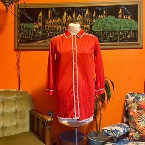 Candy red, polyester sleep shirt with lace trim.